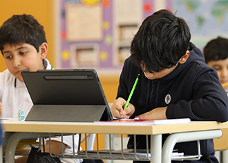 Student working in class